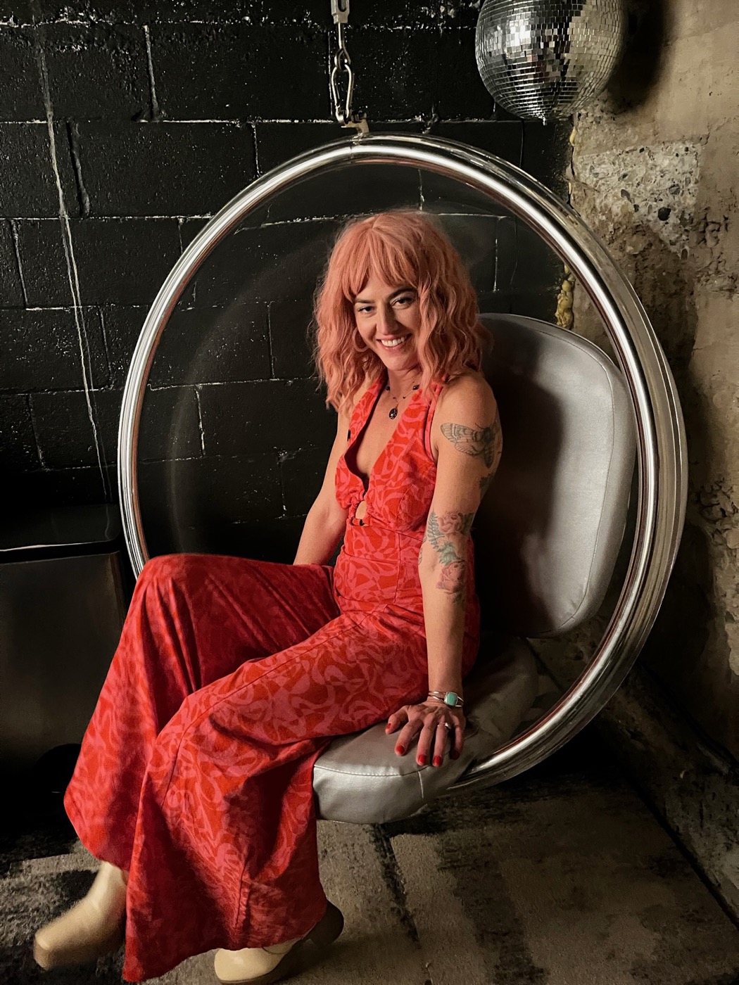 Hayley in a red jumpsuit